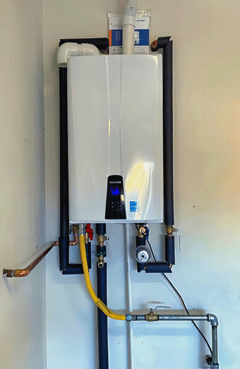 https://wembleyhotwater.com.au/uploads/2025/06/instant-hot-water-systems-63860.jpg